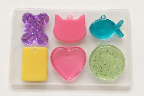 Molde de silicona llavero varios modelos gato-corazon-huesito y mas